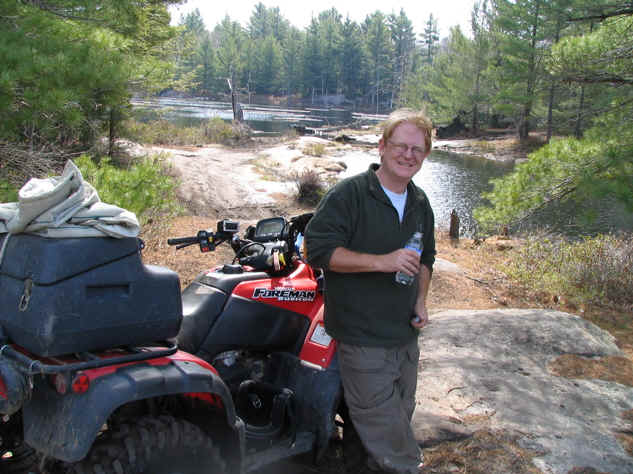 Andrew Ryeland founder of Bear Claw Tours with an early guide machine.